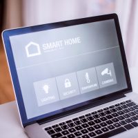 A laptop with smart home screen. A laptop with smart home screen.
